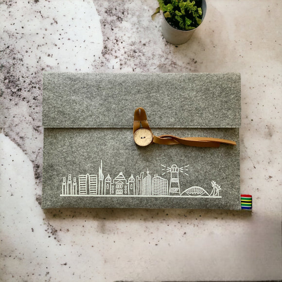 grey laptop sleeve with white Durban skyline print