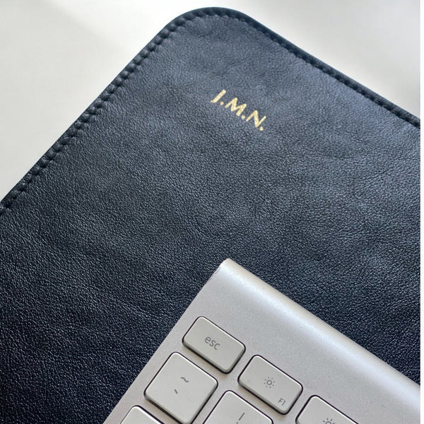 Genuine leather desk mat with gold embossed initials for personalised corporate gifting