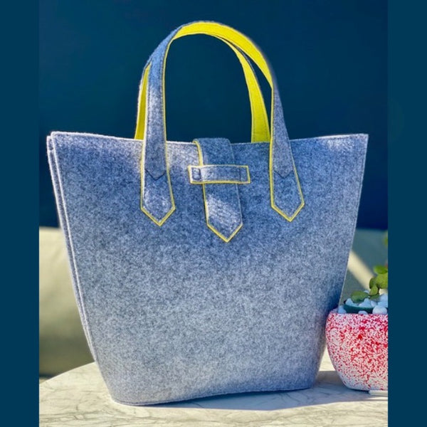 Stylish Felt Handbag with yellow lining made from recycled plastic bottles. 