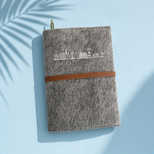 A5 Notebook, felt cover grey , removable and reusable, white Durban Skyline print,  leather tie closure. 