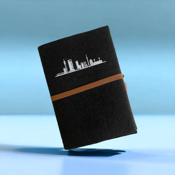 A5 Journal in black made from eco felt, with Johannesburg skyline print 
