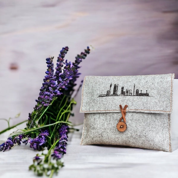 Light-grey small multi purpose pouch made from pure wool felt.